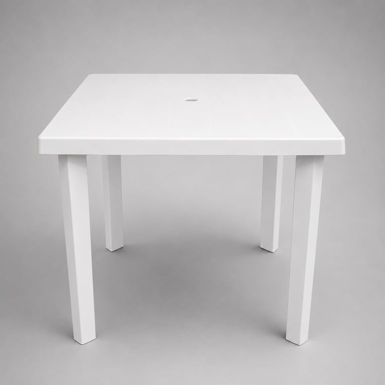 White rectangular dining table with four sturdy legs on a neutral gray background