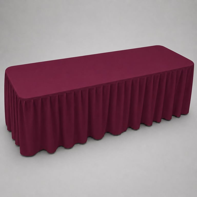 Burgundy pleated table skirt covering a rectangular table against a light gray background