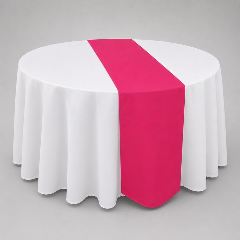 White round table with pink tablecloth runner draped across the surface