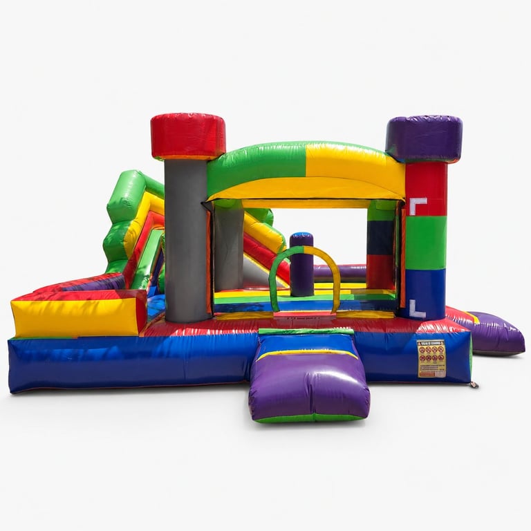 Colorful inflatable bounce house with slide, climbing wall, and play structures in red, yellow, green, blue, and purple