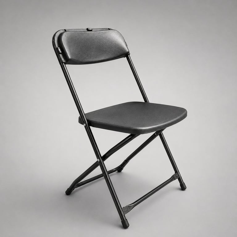 Black folding chair with padded seat and backrest against a neutral gray background