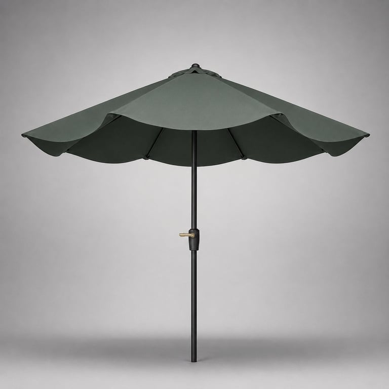 Large green patio umbrella with a center pole and scalloped edges against a neutral gray background